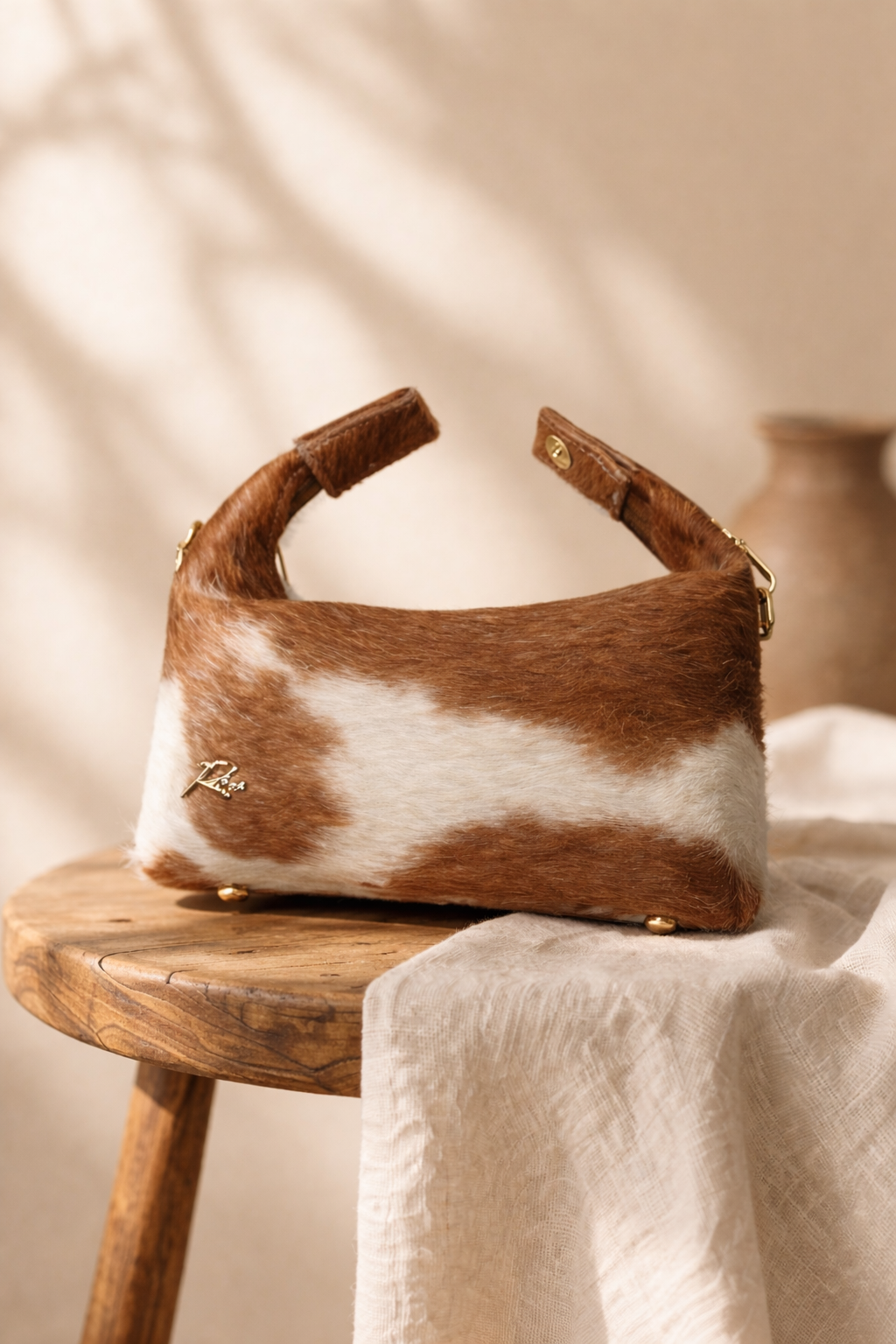 Cow-hide Mini hobo bag